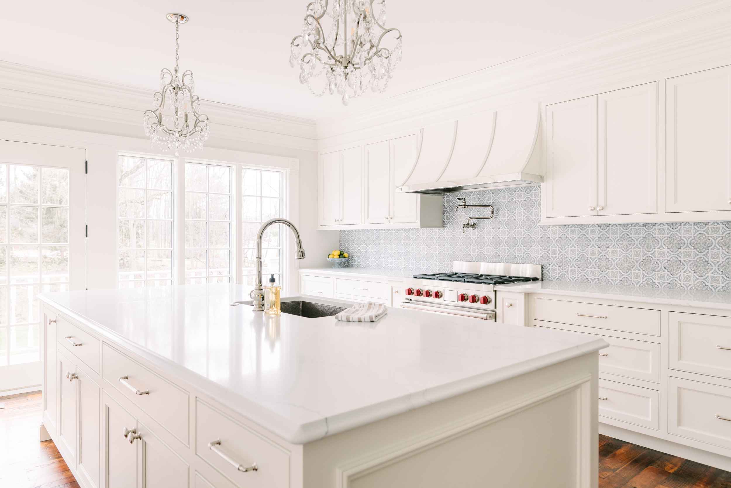 large white kitchen island in victorian remodel in cleveland