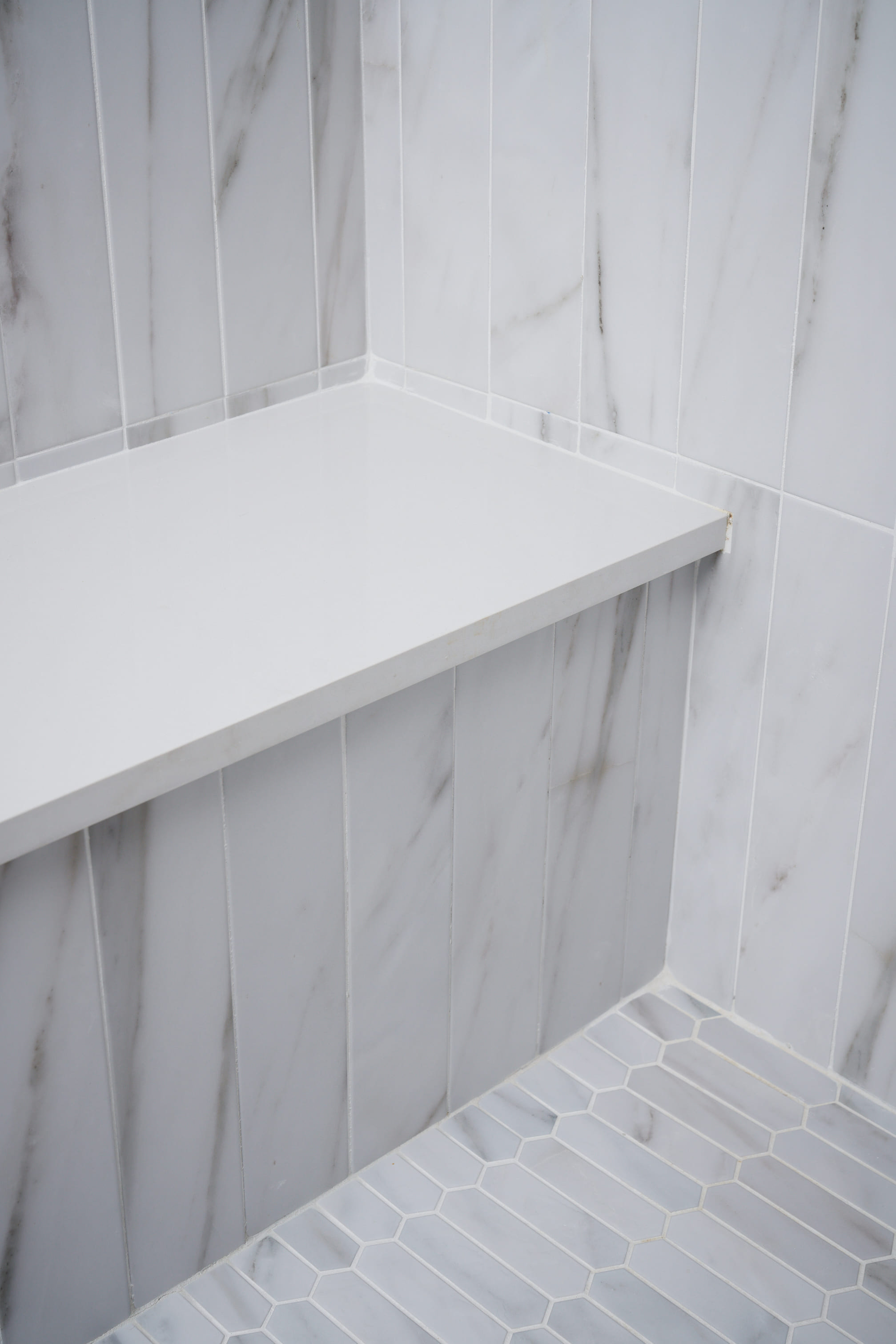 white tile shower