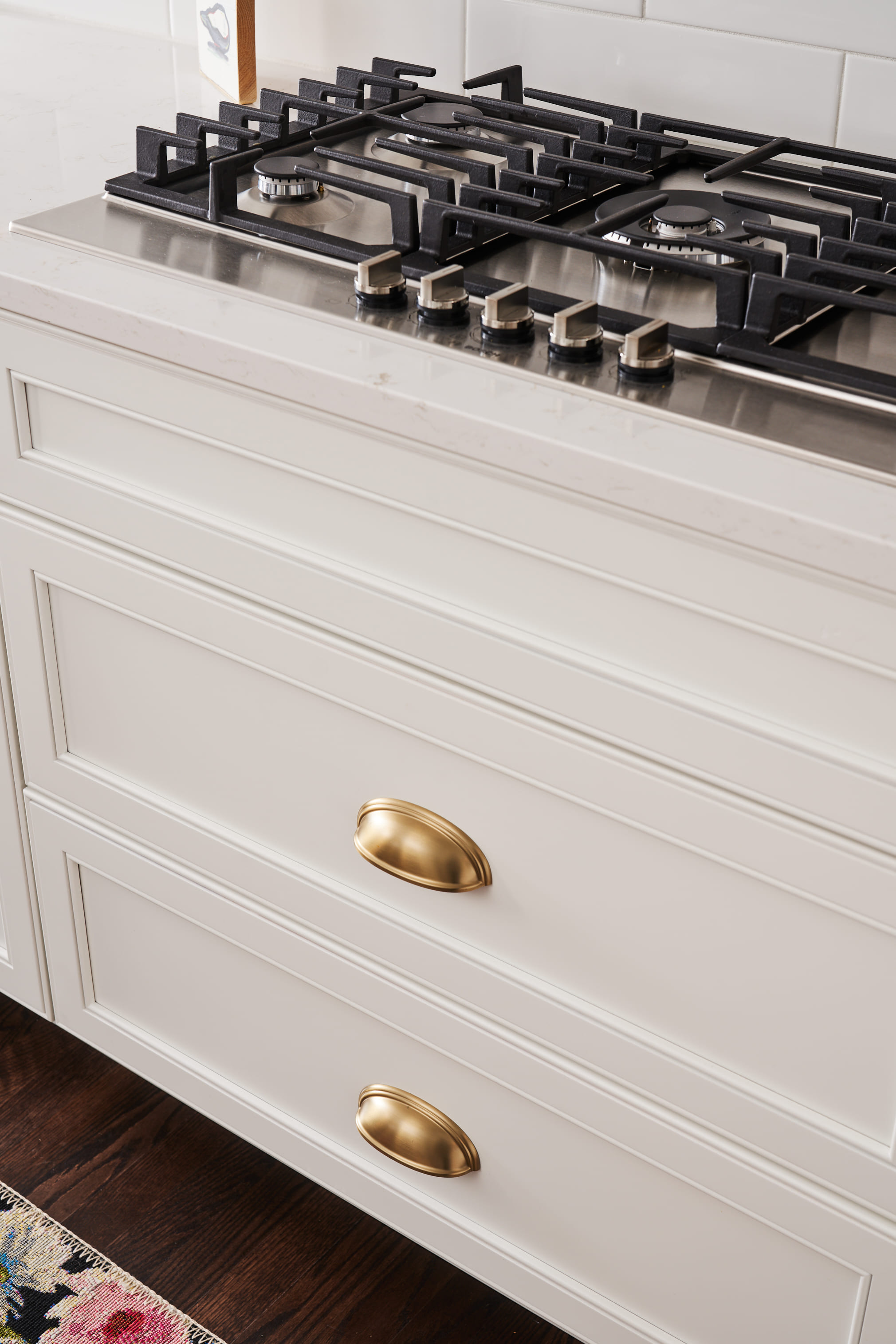 stove top with white drawers