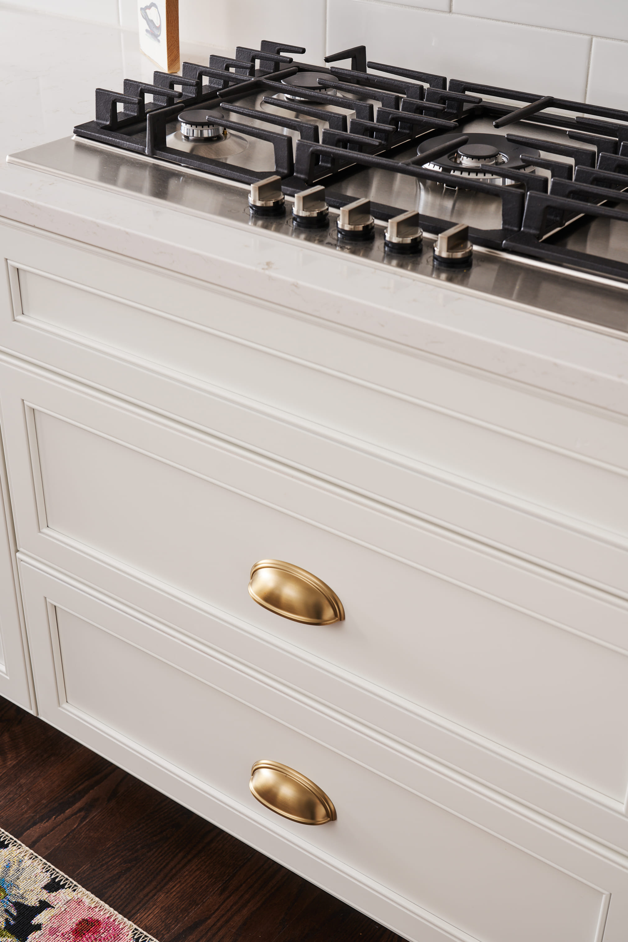 stove top with white drawers kitchen remodel