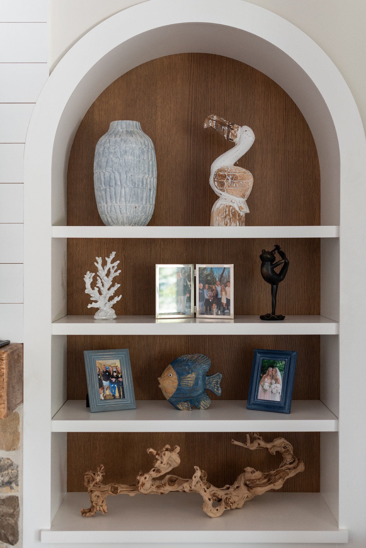 arched built in bookshelf