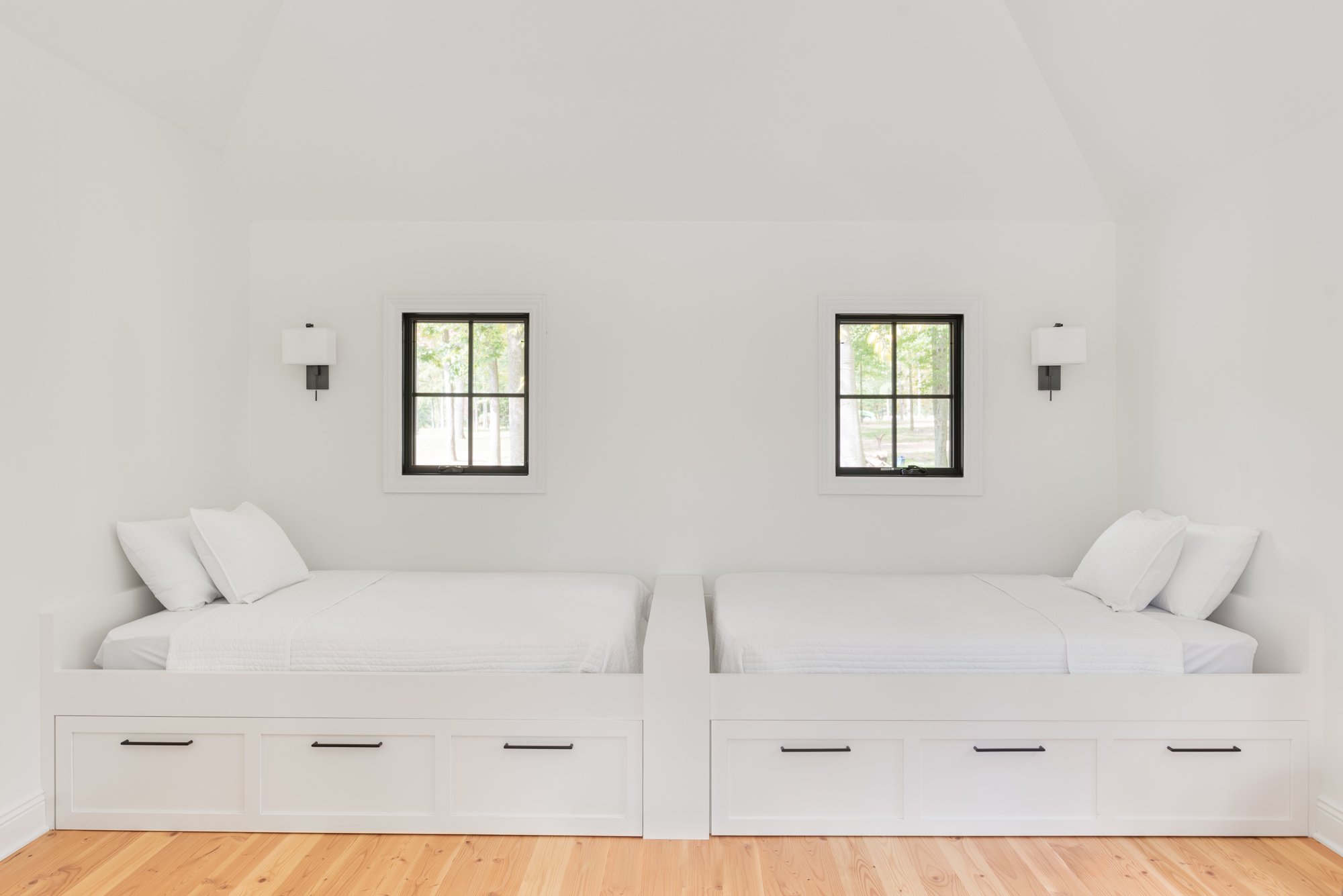 white bedroom with black trim windows