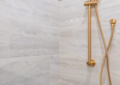 marble tiled shower remodel