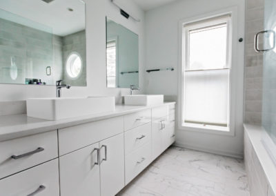 master bathroom white vanity with double raised sinks