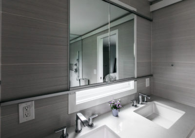modern gray bathroom with double undermounted sinks