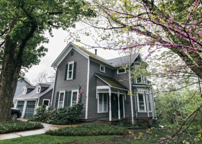 gray and white century home exterior