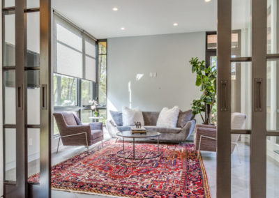 sliding french doors leading to sitting room