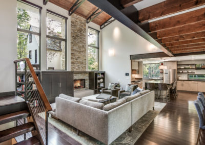 modern industrial living room with large windows