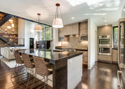 modern industrial kitchen with stainless steel appliances