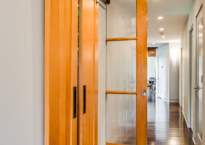 sliding wood doors leading to closet