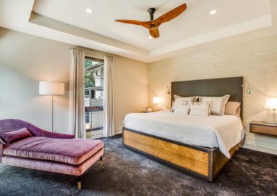 remodeled master bedroom with tray ceiling