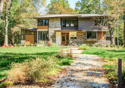 modern home exterior with thin stonework