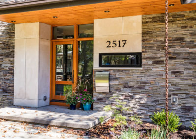 exterior of modern home with stonework