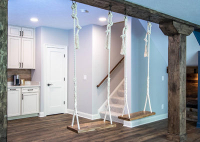 indoor swing set in custom finished basement