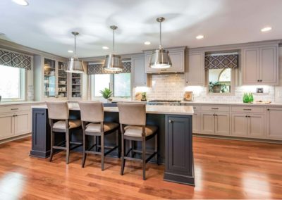 L shaped gray kitchen with island