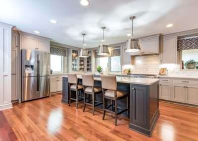 L shaped gray kitchen with island