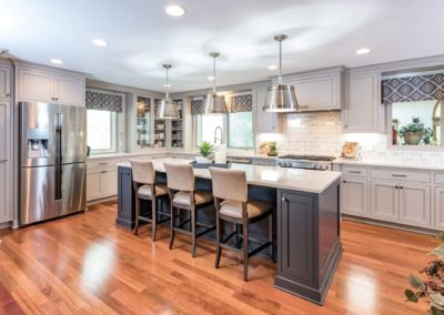 two toned gray kitchen with large island