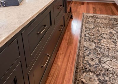 two toned kitchen with light and dark gray cabinets