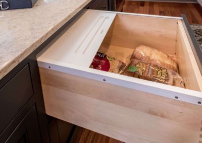 pull-out bread drawer in custom kitchen