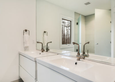 modern white bathroom remodel with double sinks
