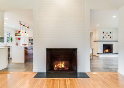 modern fireplace surround in high end home remodel