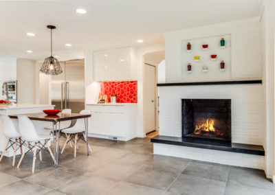 modern kitchen remodel with white brick fireplace