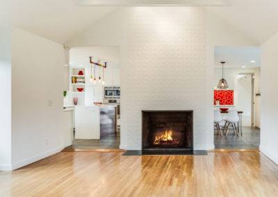 modern living area with white fireplace