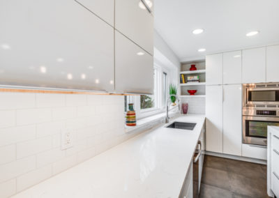 white kitchen countertop and undermount sink