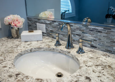 master bathroom vanity with white and brown counter