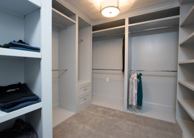 renovated master closet with built in storage