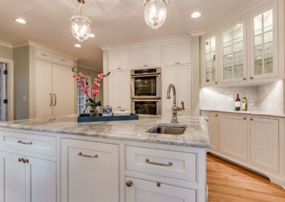 white kitchen remodel with center island