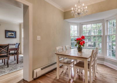 dining area with bay window off kitchen