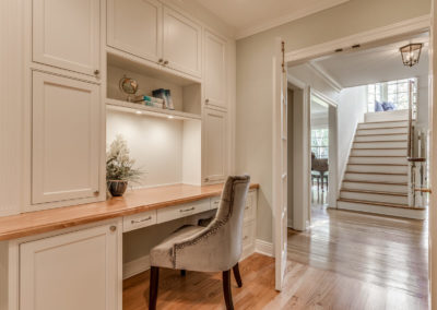 custom built in desk in office open to hallway