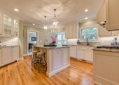 kitchen renovation with dual sinks and recessed lighting