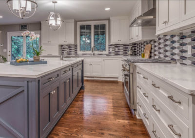 two toned kitchen remodel with gray and blue backsplash