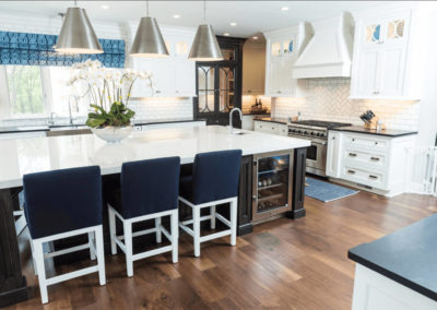 navy blue and white stools at large kitchen island