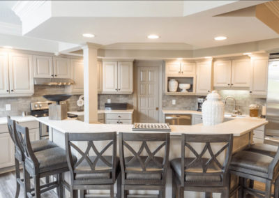 neutral kitchen with curved center island