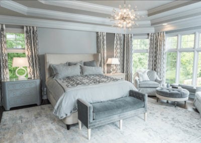 gray master bedroom with tray ceiling
