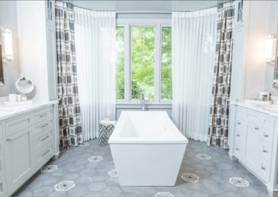 remodeled bathroom with freestanding square tub