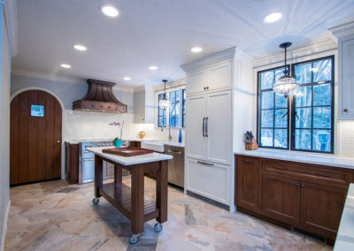 traditional tudor kitchen with cabinet panel refrigerator