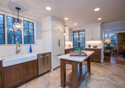 modern tudor traditional kitchen remodel with farm sink and white cabinets