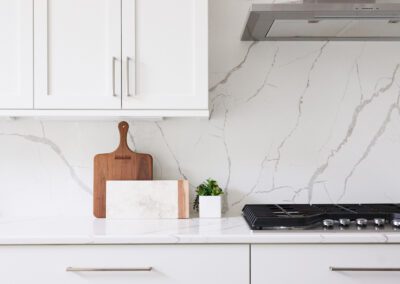 White Upper Cabinets with White Marble Backsplash Ohio