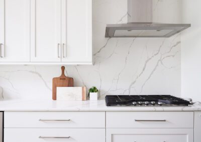 Kitchen Renovation White Cabinets with Silver Accent 