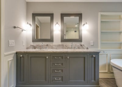 gray double sink vanity with crystal knobs