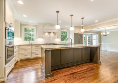 remodeled white kitchen with center island