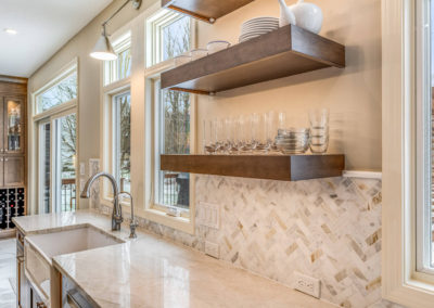 brown floating shelves above kitchen countertops