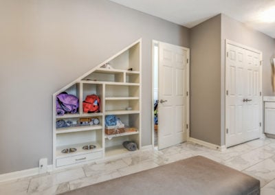 mudroom entry with built in shelving