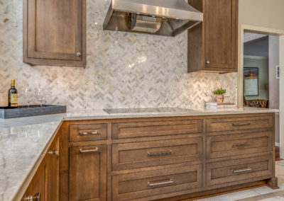 kitchen remodel with stainless steel stove range hood