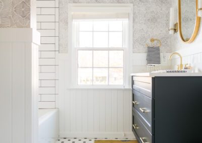 White and Gold Bathroom with Tub