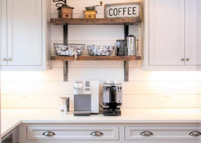 shaker style gray kitchen cabinets with wood shelves